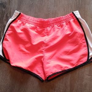 Pink and white athletic shorts